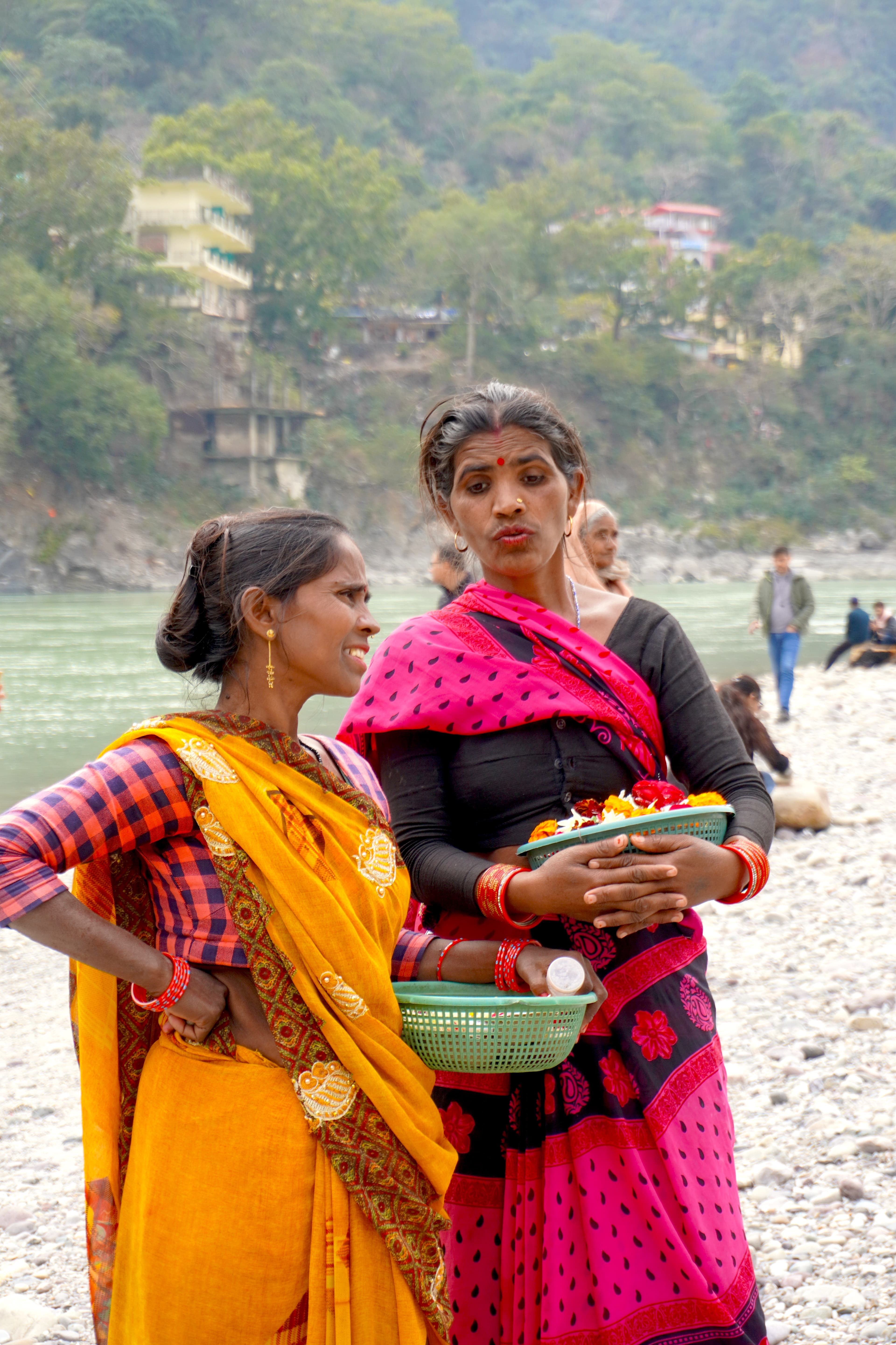 Portrait of two women talking at Ganga Ghat, Rishikesh, India